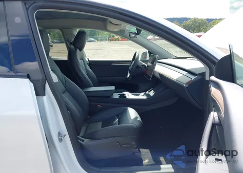 2024 Tesla Model Y Long Range Dual Motor All-Wheel Drive from USA, damaged, VIN 7SAYGAEE2RF118125